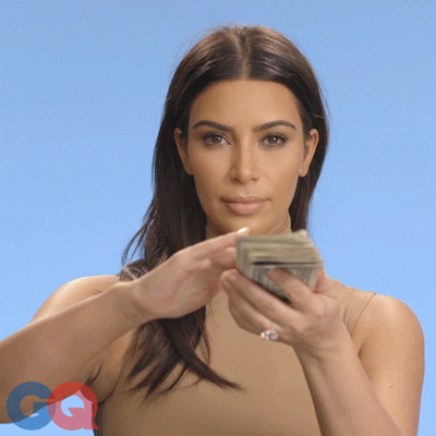 kim kardashian with lots of dollar bills