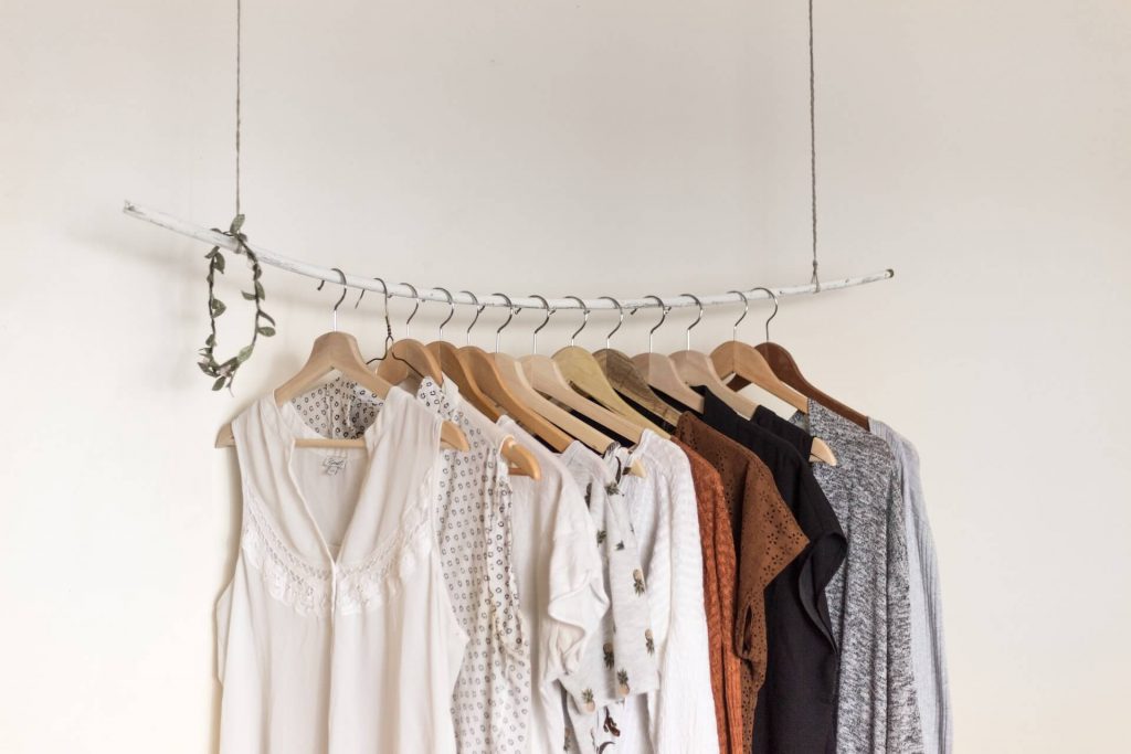 a rail of neutral toned clothes