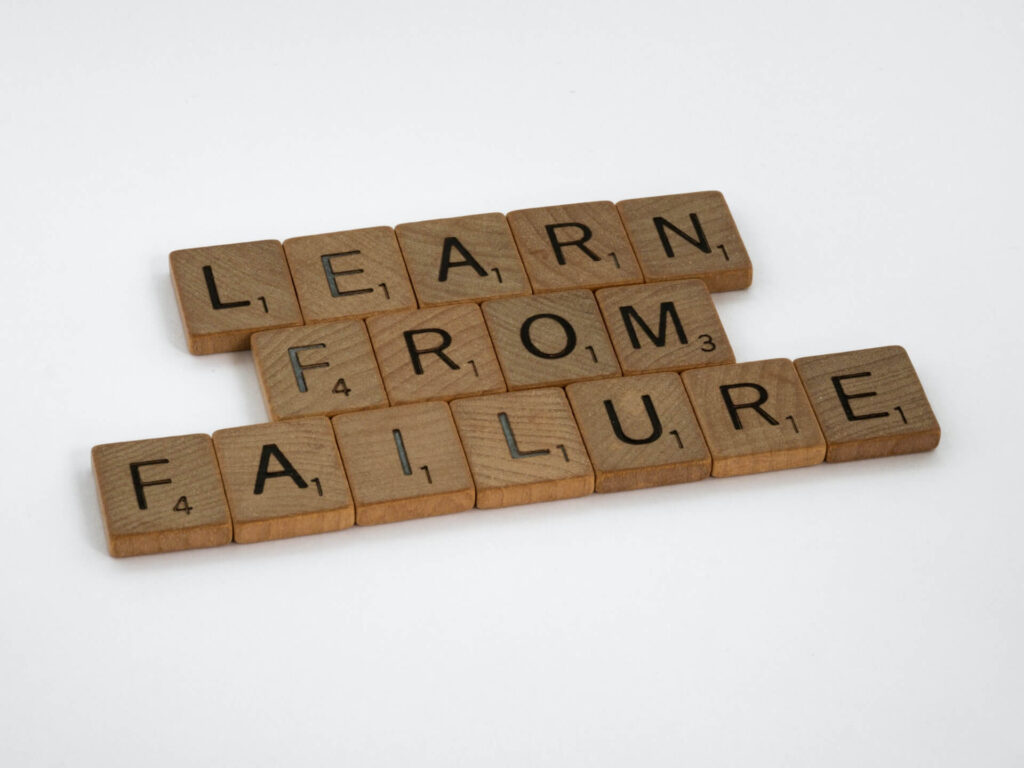 letters spelling out 'learn from failure'